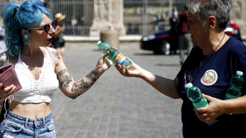 Italy and Spain scorched by heatwaves as cities issue red alerts