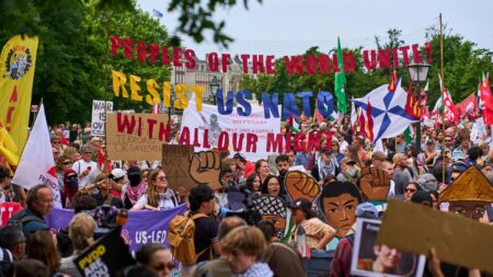 Hundreds take to the street in the Hague to demonstrate against NATO