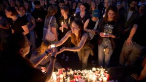Graz residents hold mass, vigil to mourn victims of deadly shooting