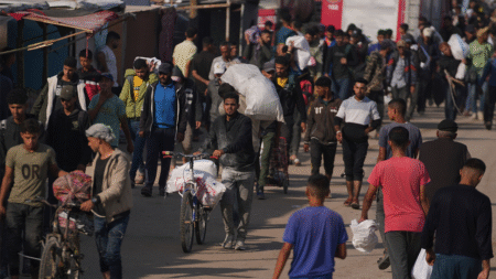 Dozens of Palestinians killed on their way to collect aid in Gaza, Hamas-run ministry claims