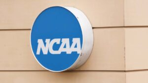 Federal judge approves .8B settlement allowing schools to directly pay college athletes
