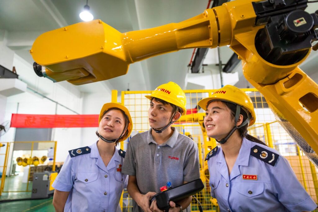 Should AI And Robots Be Taxed To Protect Workers?