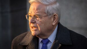 Menendez to report to prison for 11-year term for corruption