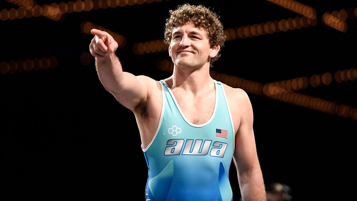 Olympian Ben Askren points to the crowd as he enters the mat to face fellow Olympian and New Jersey native Jordan Burroughs (not pictured) during the Beat the Streets "Grapple at the Garden" on Monday, May 6, 2019, in New York.