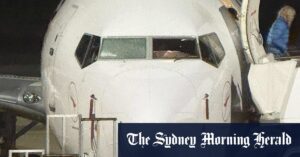Qantas plane windscreen smashed at Brisbane Airport