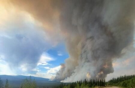 Nearly 200 homes on alert for Yukon wildfires as early season heat event hits