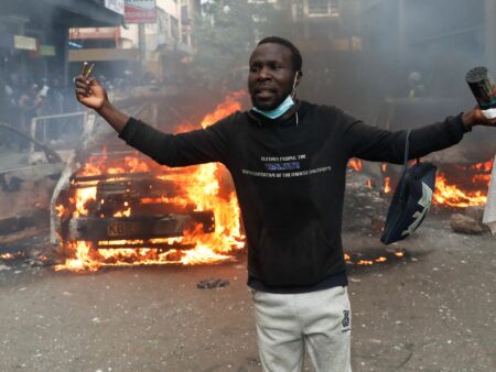Police fire tear gas on crowds protesting Kenya blogger’s death in custody