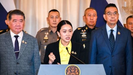 Thai PM claims she has coalition support after resignation calls