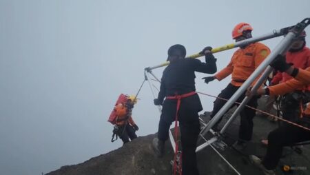 Indonesian rescuers recover body of Brazilian tourist who fell off volcano cliff