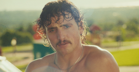 Benson Boone Pokes Fun at His Haters, Gets Shirtless and Sudsy in ‘Mr. Electric Blue’ Music Video