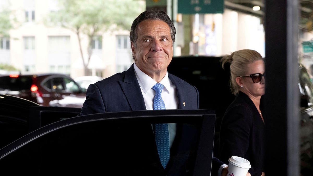 Cuomo getting out of car
