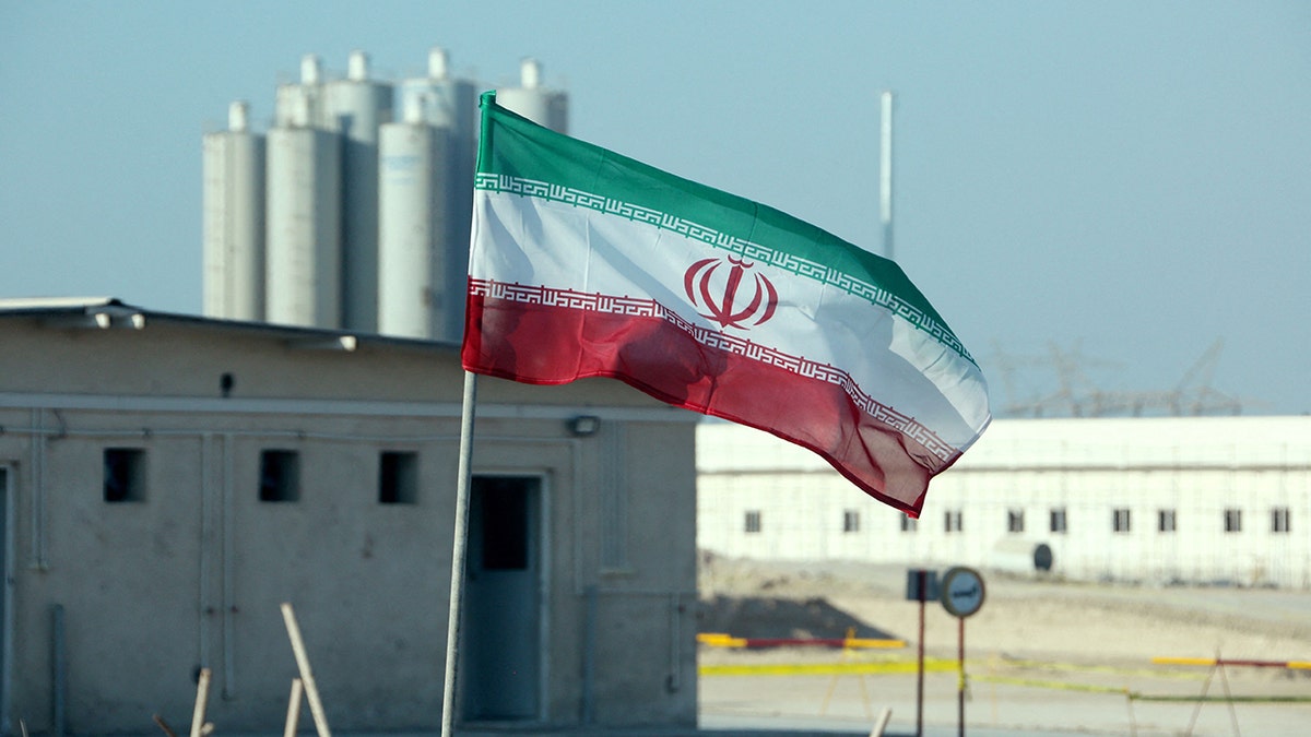 Iran flag in front of reactor