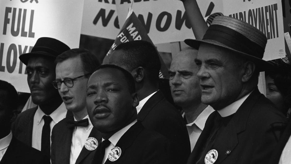 View of American Religious and Civil Rights leader Dr Martin Luther King Jr (1929 - 1968) (center) at the March on Washington for Jobs and Freedom, where he would deliver his 'I Have a Dream' speech, Washington DC, August 28, 1963.