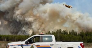 As Manitoba wildfires rage, premier asks more people to evacuate