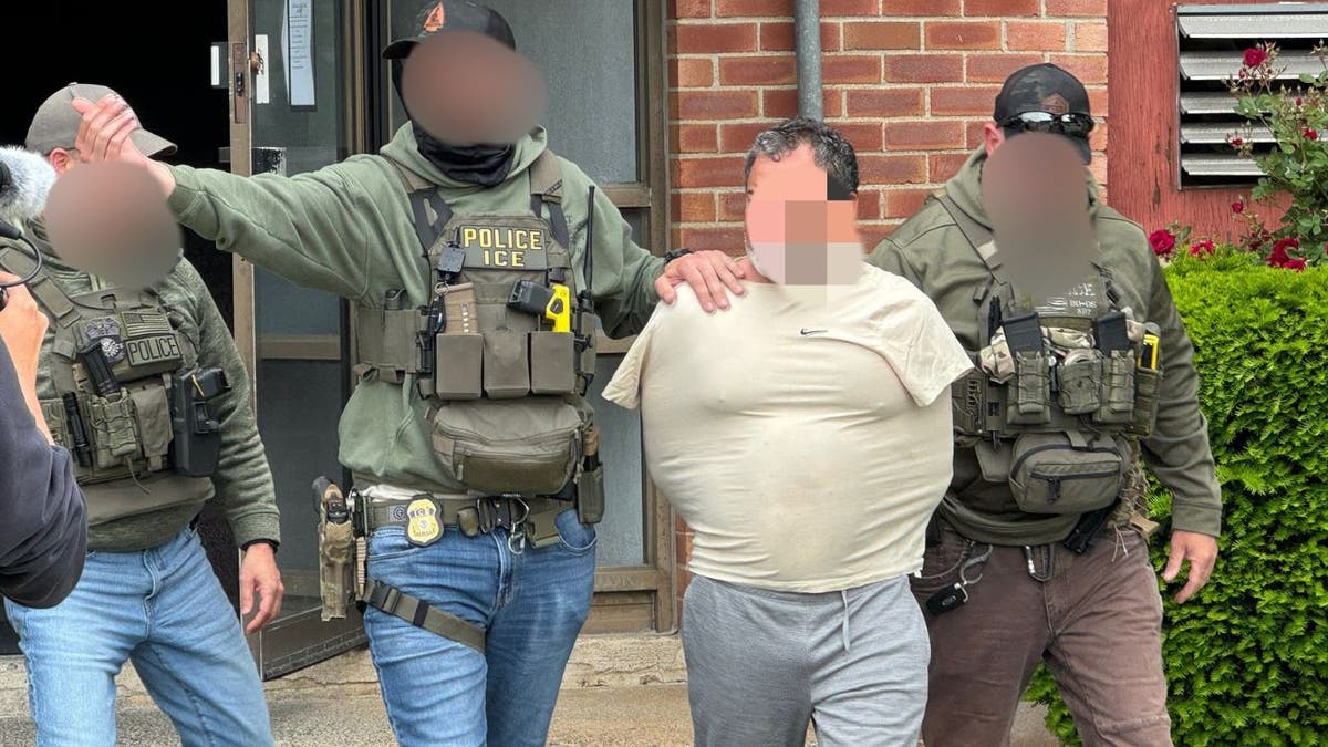 blurred out faces in migrant arrest photo