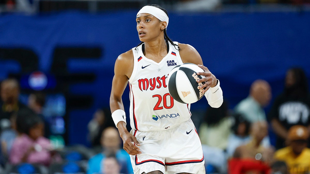 Brittney Sykes dribbles