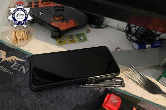 A phone seized under Operation Cumberland, a global sting targeting the alleged production and distribution of child abuse material generated by artificial intelligence.