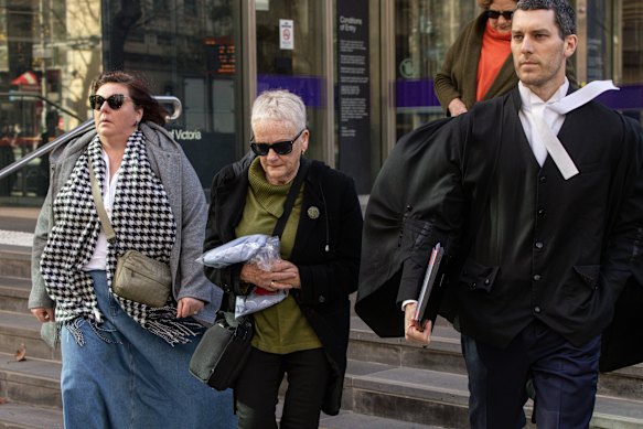 Supporters and lawyer of Robert Eccles outside court on Monday.