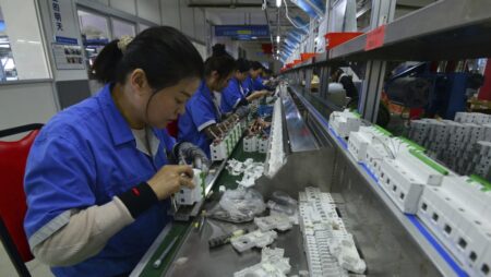 China factory output slows but consumption offers bright spot