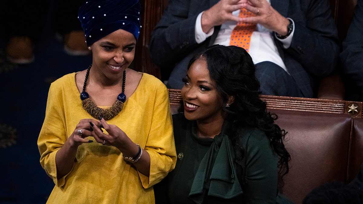 Ilhan Omar and Jasmine Crockett on the House floor