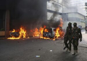 Kenyan police fire tear gas at protest over death of blogger in custody