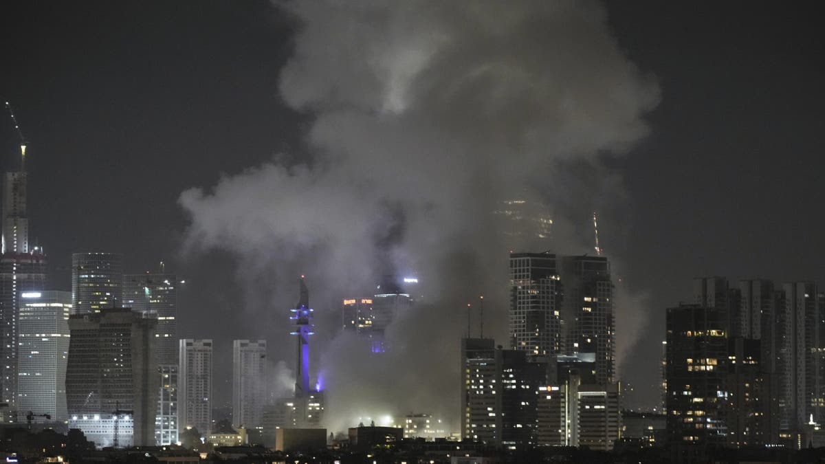 Smoke rises after a missile attack in Tel Aviv, Israel