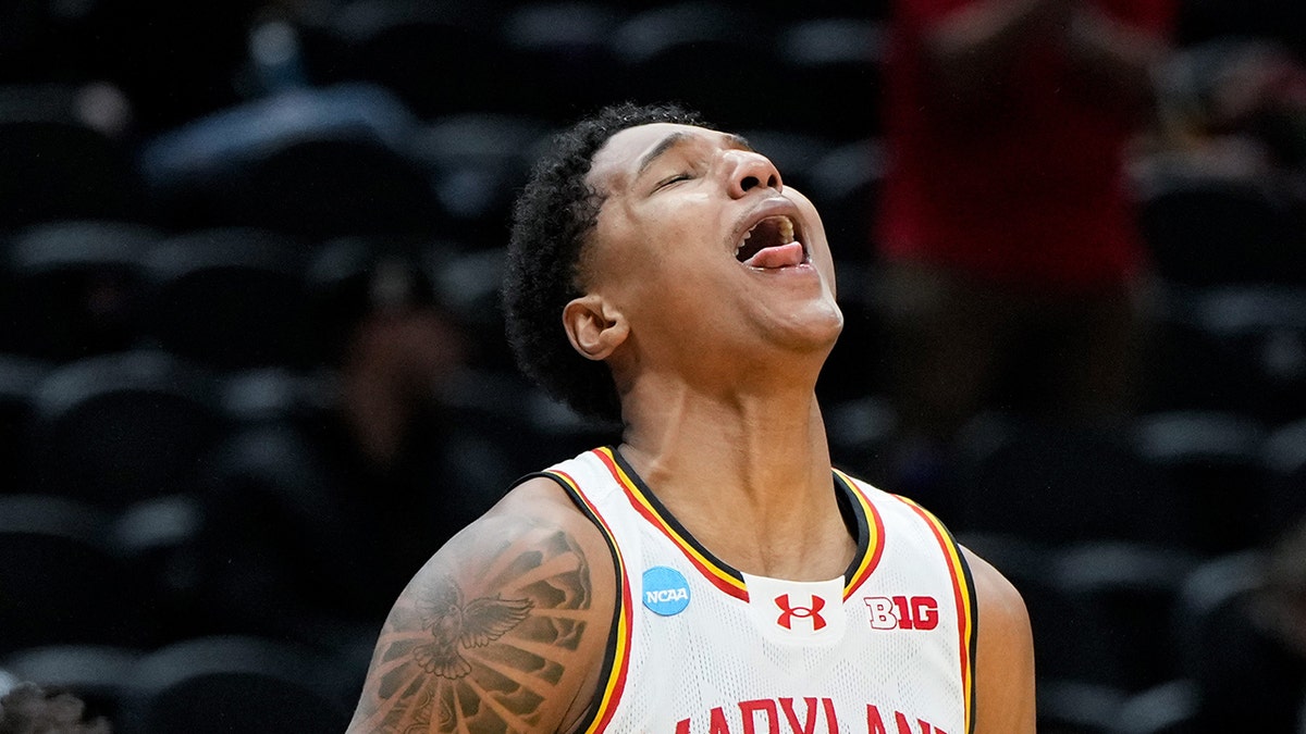 Julian Reese celebrates on court