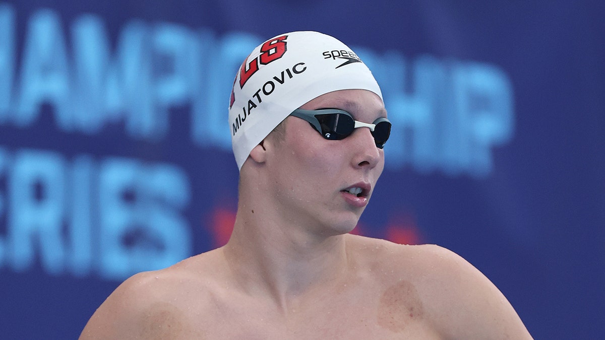 Luka Mijatovic looks out into pool