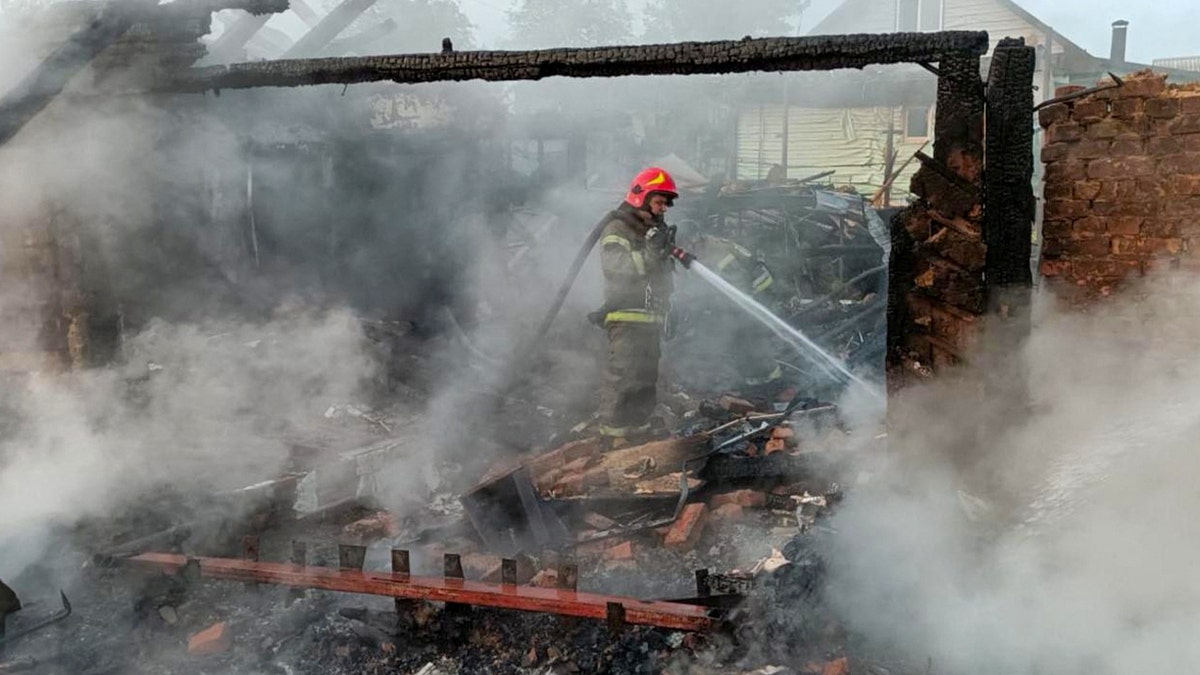 Firefighter at the scene of a Russian drone strike