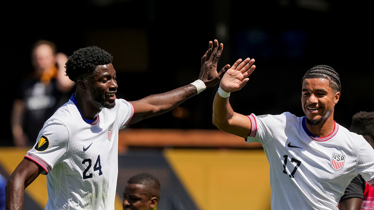 Malik Tillman celebrates goal
