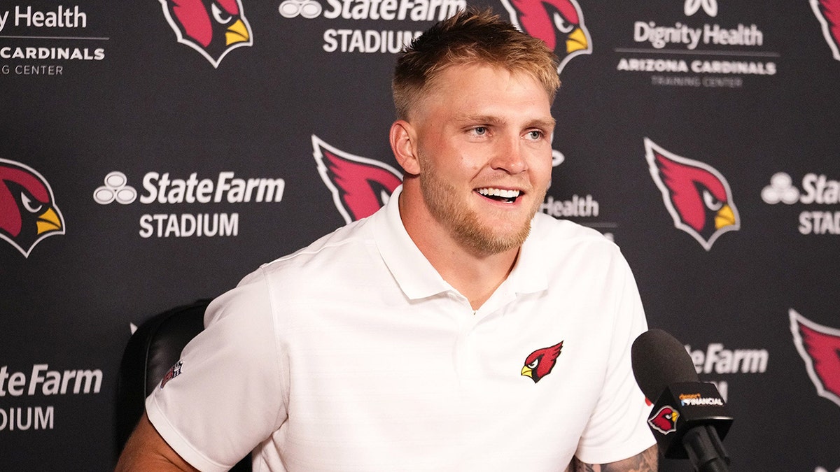 Trey McBride smiles at press conference