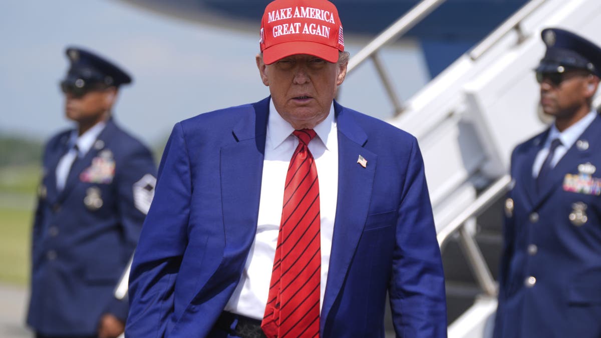 Trump getting off Air Force One