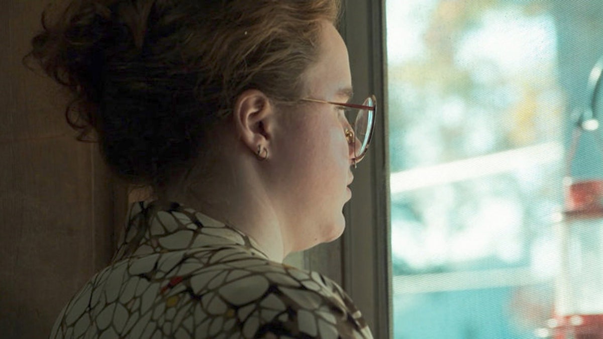 Victoria Heuermann looking outside a window.