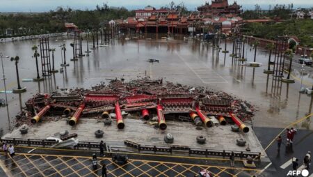 China hit by floods, landslides and heat as extreme weather takes its toll