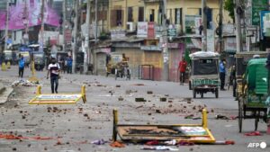Bangladesh police arrest 20 after deadly clashes in ousted premier’s hometown