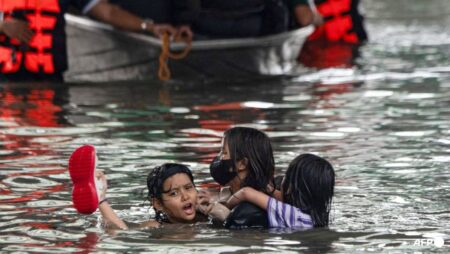 Philippine flooding displaces thousands in Manila, two missing