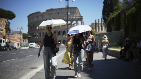 Floods and heatwave in Italy lead to two deaths amid extreme weather