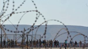 Hundreds of migrants moved to Greek mainland as Libyan arrivals surge
