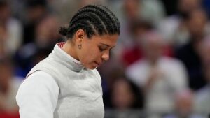 French Olympic fencer’s kiss contamination defense holds up in court as she’s cleared of doping violation