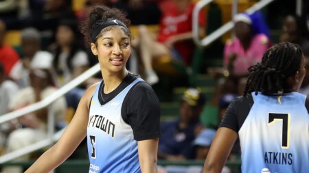 Sky star Angel Reese reacts after slapping clipboard out of coach’s hand