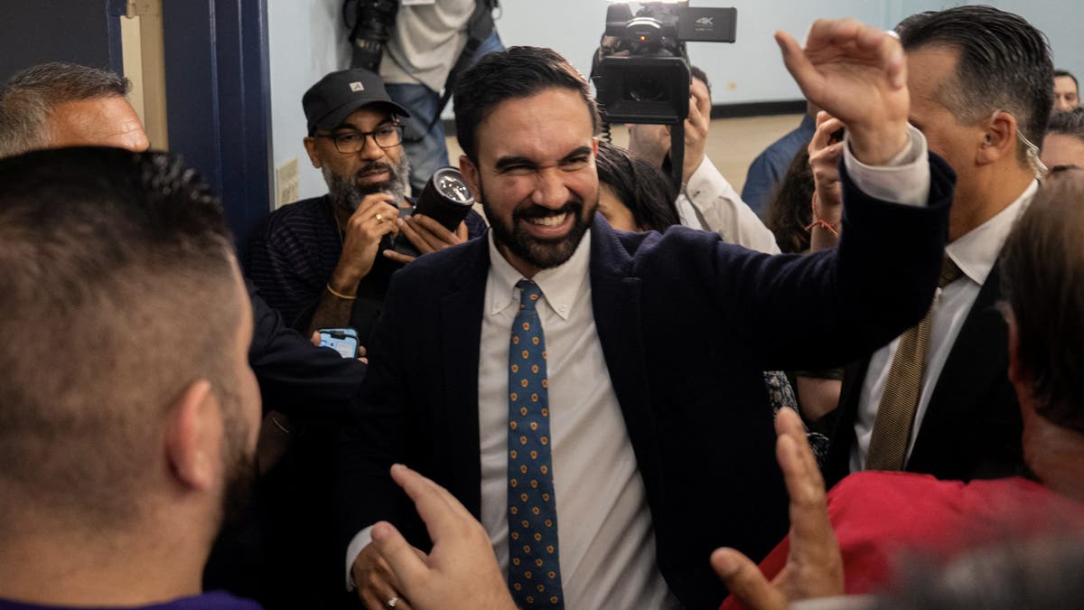 Mamdani with supporters