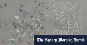 Surfers paddle out to protest deep sea mining