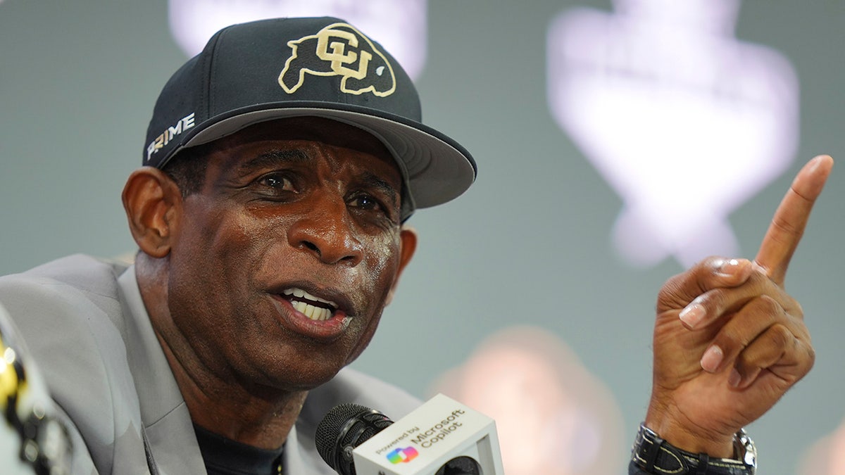 Deion Sanders at a press conference