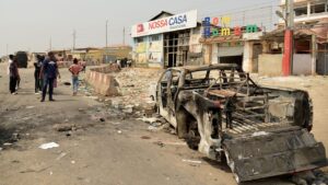 Dozens dead as violence erupts over government plans to eliminate fuel subsidies, army takes to streets
