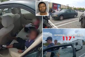 Georgia police officers break into car with two crying children trapped in 117-degree heat outside mall: video