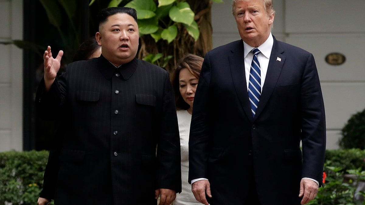Trump with North Korea's Kim to his right