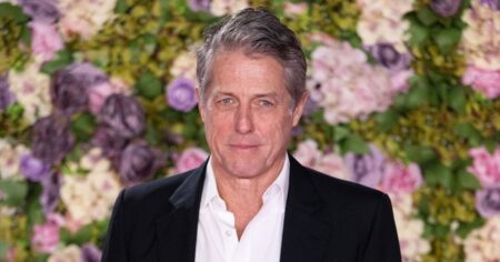 Hugh Grant Seemingly Falls Asleep at Wimbledon, Becomes an Instant Meme