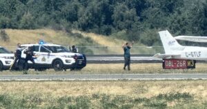 Incident at Vancouver airport temporarily halts flights, police seen on runway