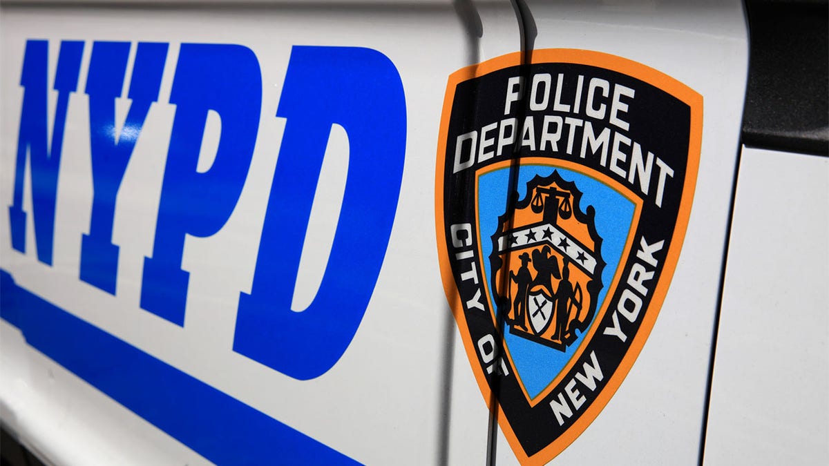 NYPD logo on police car