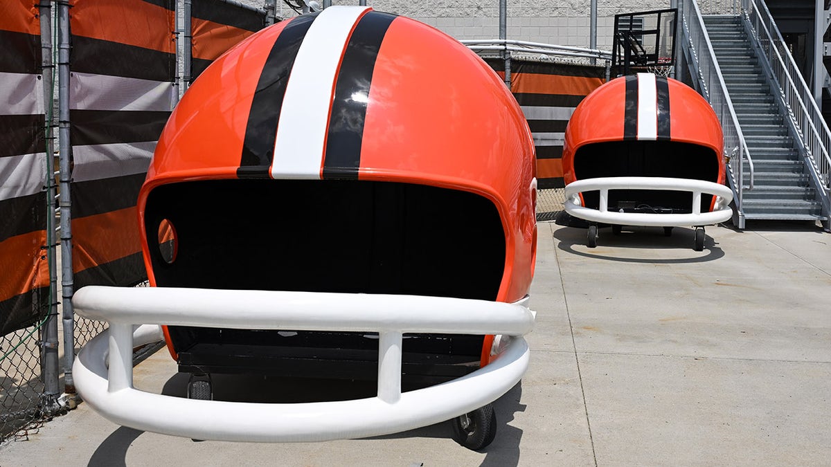 Browns helmets on ground